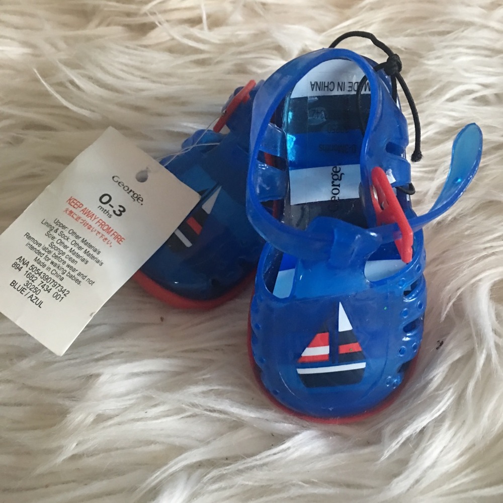 Never worn baby sandals, with tags!